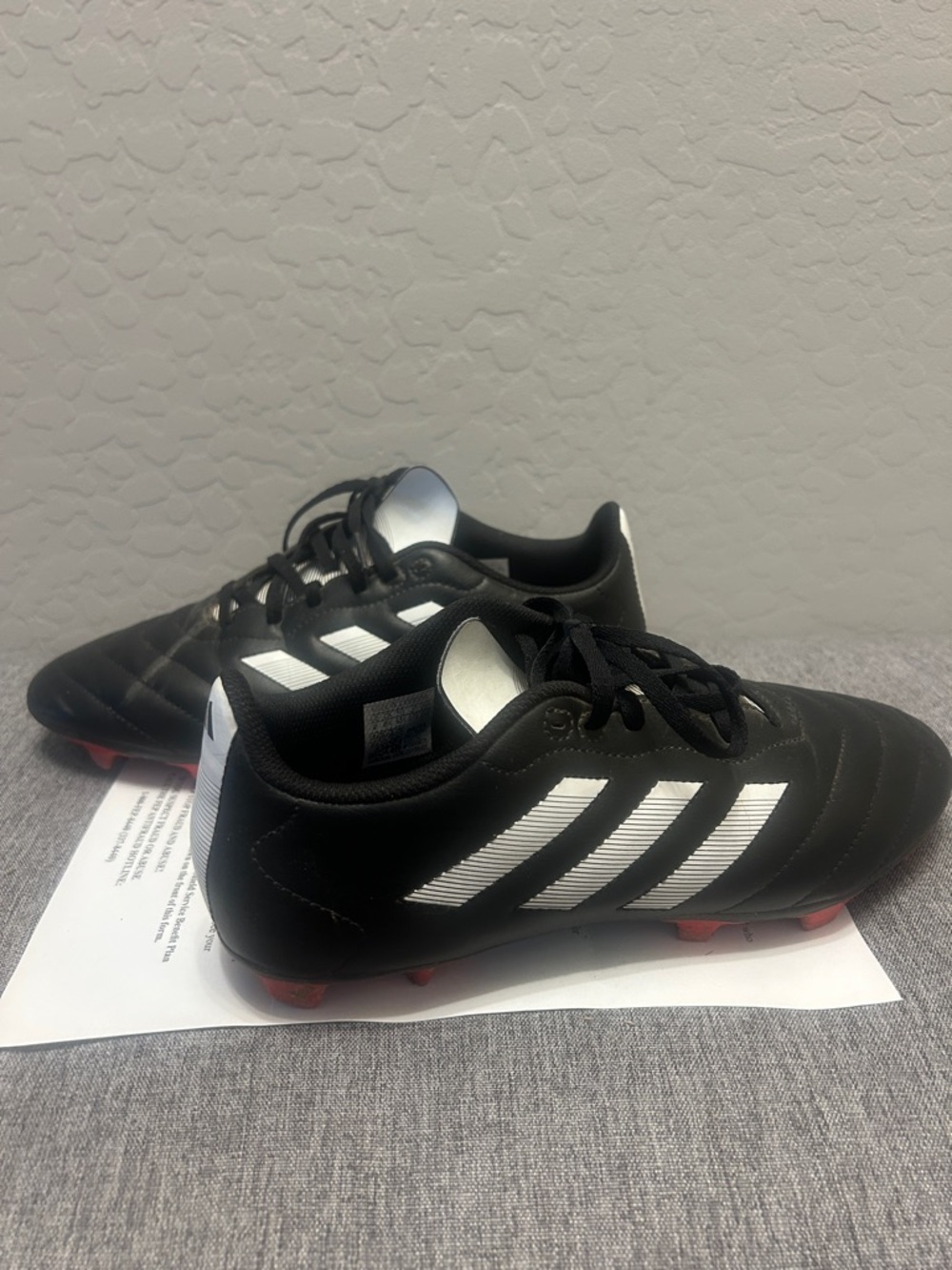 Men’s adidas Black Soccer Cleats with White Stripes and Red Studs size 9